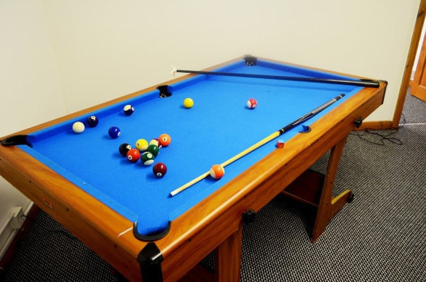 pool table with multiple games