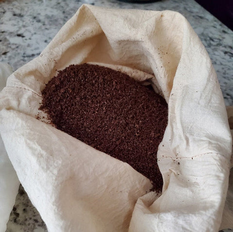 ground coffee in nut milk bag