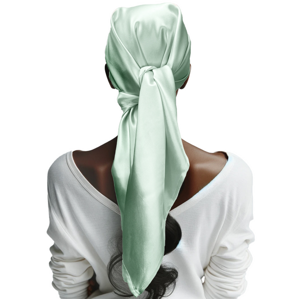 model wearing silk head scarf in green