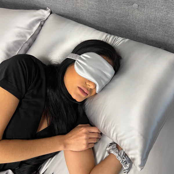 Woman Sleeping on Silk Pillowcase with Silk Sleep Mask