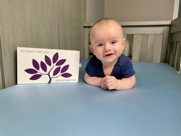 Baby on Silk Sheets