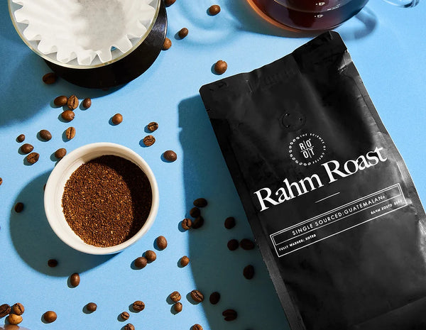 Coffee Beans from Rahm Roast beside a coffee cup