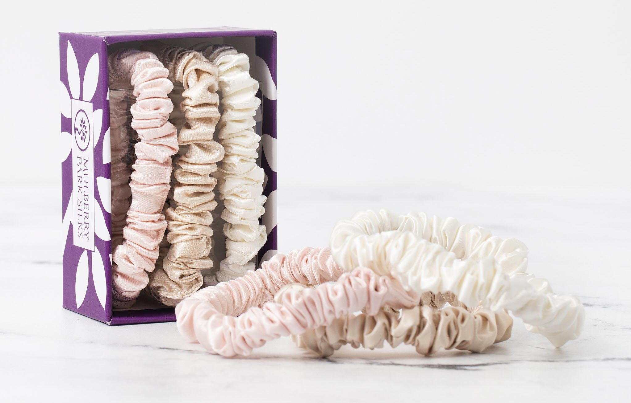 Stacked of Silk Scrunchie in Ivory, Pink and Sand color