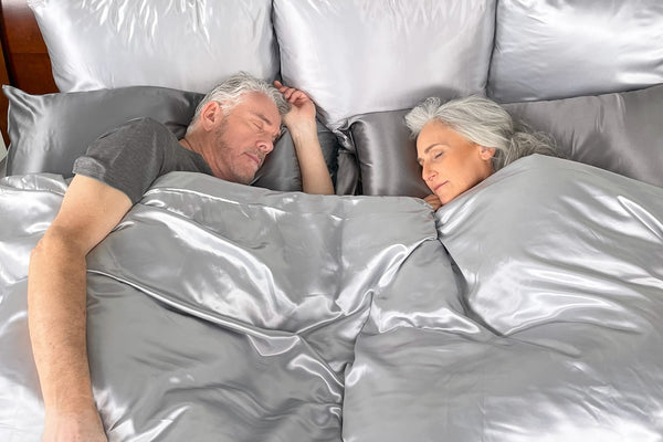 couple in Silk Bedding