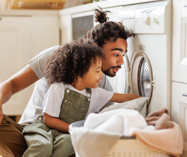 Father and Son Doing Laundry