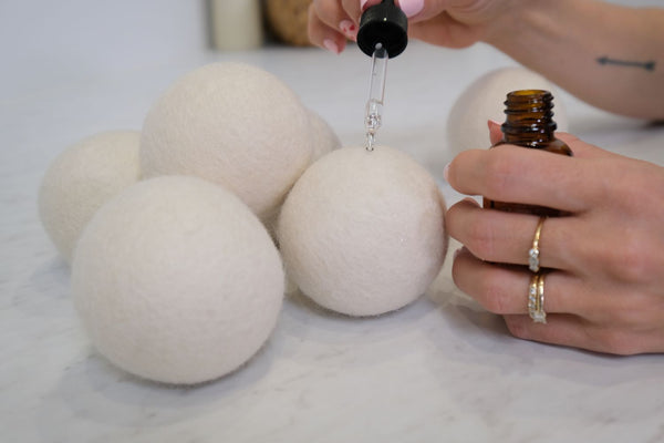 Putting Essential Oil on Dryer Balls