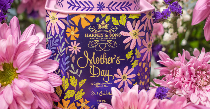 Mother's Day caffeine-free tea tin from Harney & Sons surrounded by flowers (it's a flower tea)