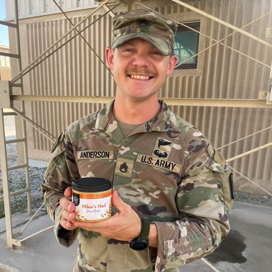 Army Officer holding Hiker's Haul Peanut butter