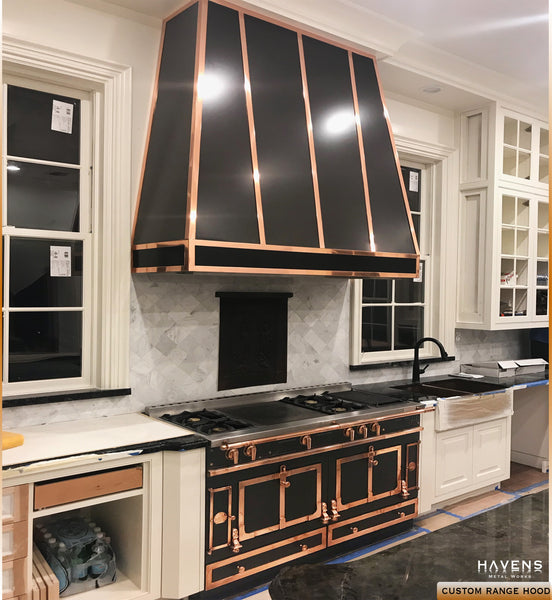 Custom black range hood with copper stranding 