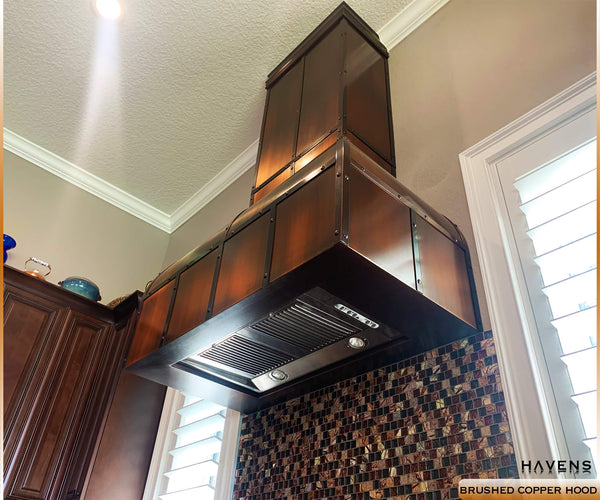 custom 14 gauge copper range hood with 600 cfm motor and blower liner