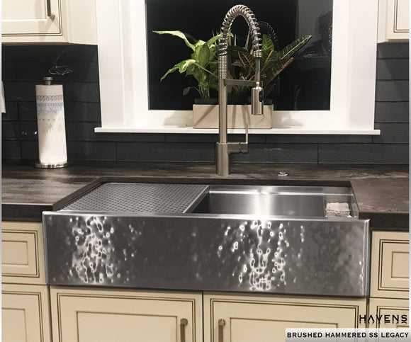 Hammered stainless steel farmhouse sink. Apron front sink with a hammered finish. Select undermount and farm sink sizes in the inches.