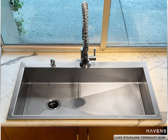 topmount stainless steel sink with faucets