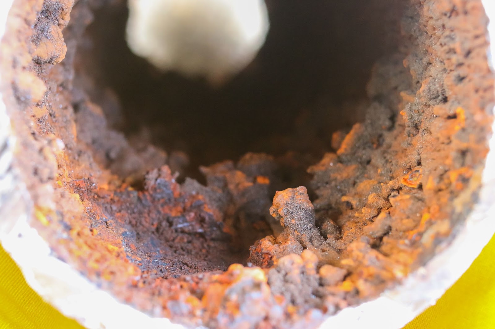 Tuberculation in a corroded iron pipe.