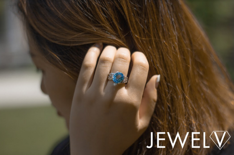 woman-wearing-gemstone-ring