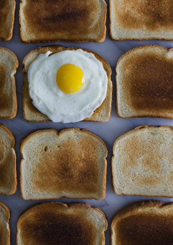 image of toast and an egg - slim wallet