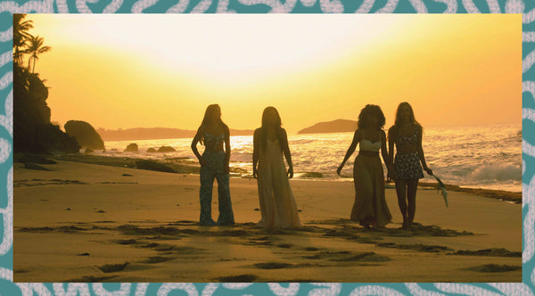 Photo of valija girls at the beach at sunset.