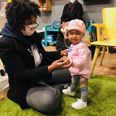 baby and mom try on first shoes ever