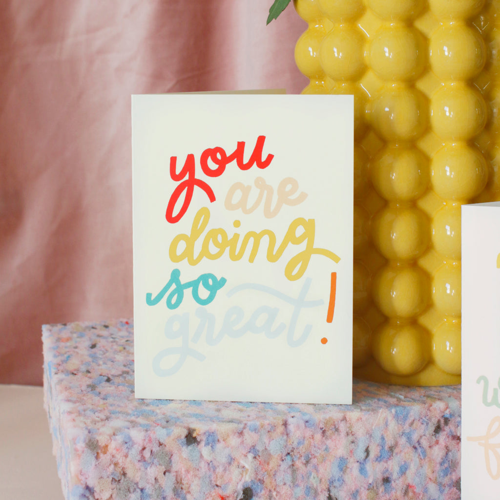 rainbow lettered and embossed card that reads "You are doing so great!"