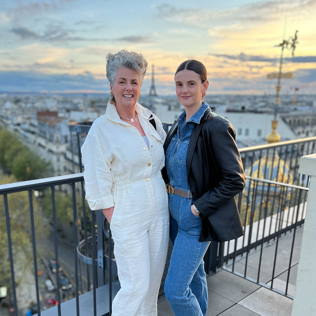 Image of Maxine & Darcy stood on a balcony in Paris 