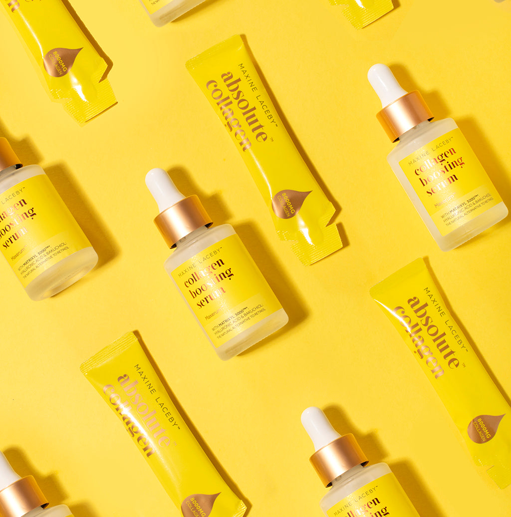 Image of yellow Absolute Collagen sachets and serum bottles on a yellow background