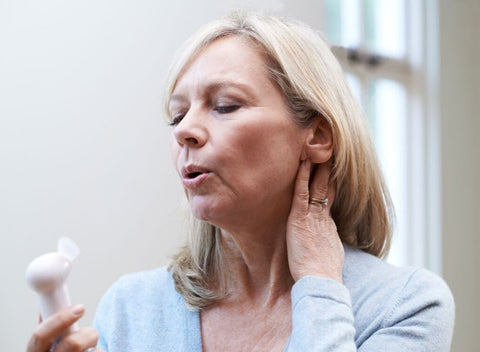 Woman experiencing hot flashes. Is collagen good for menopause hot flashes?