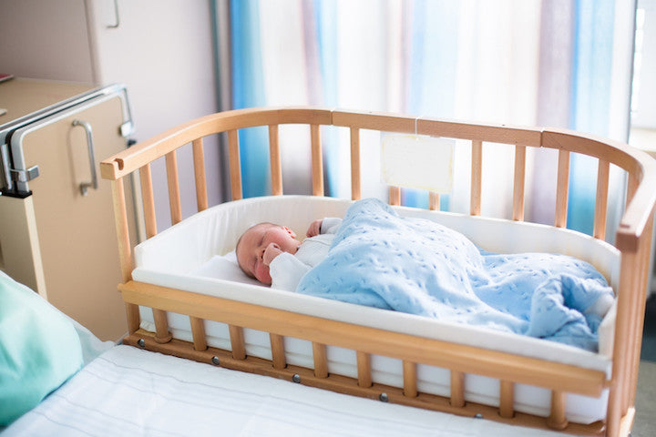 baby crib in parents room