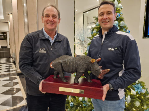 STAR Scheme managing director Christian Lang receives The Rhino Trophy from Rhino CEO Reg Clark