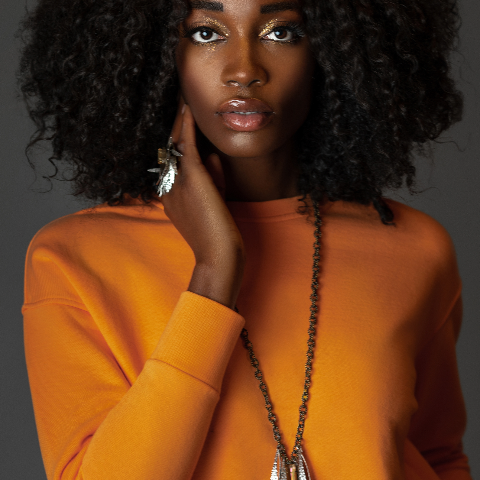 Woman of color wearing silver jewelry