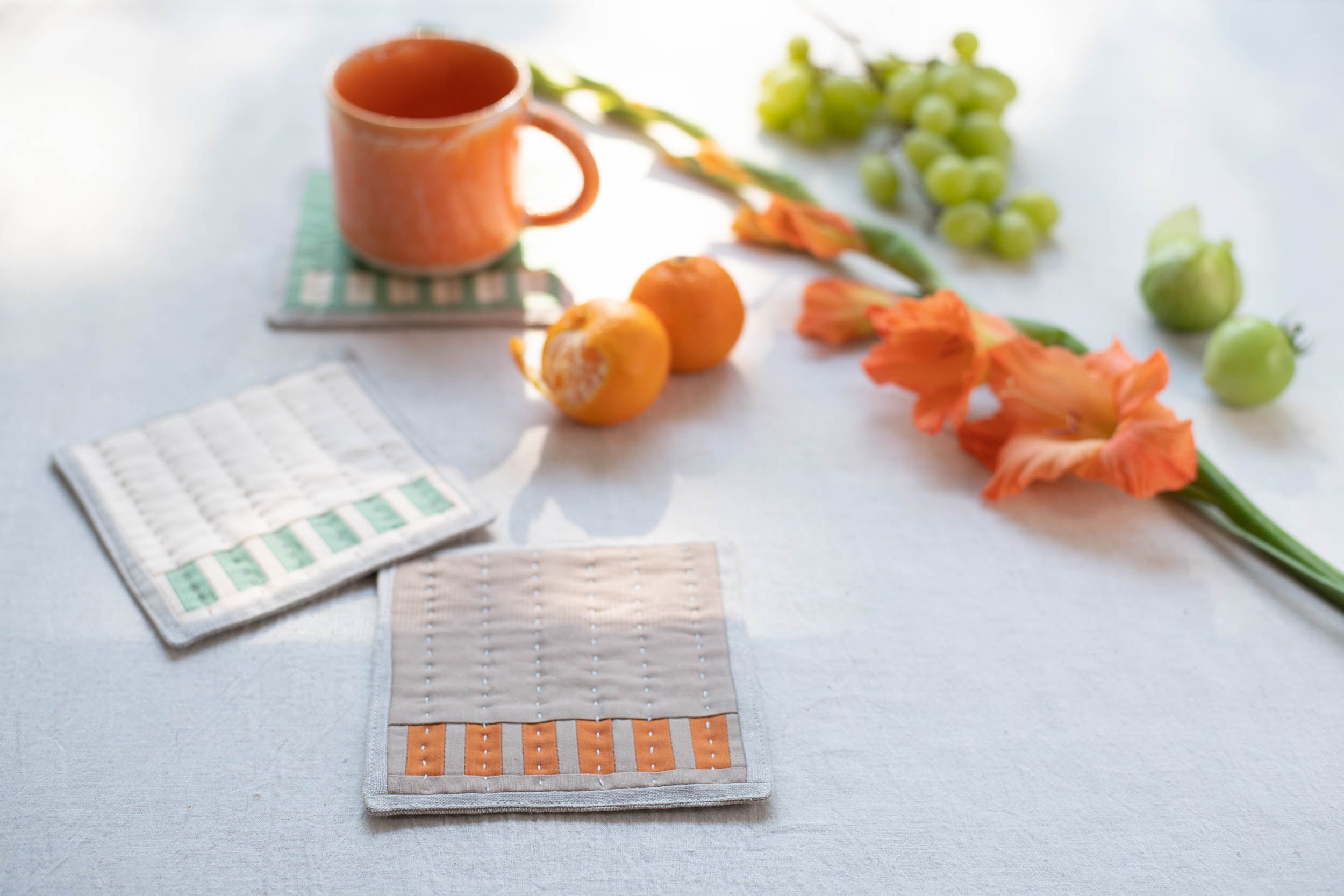 Sewn coasters by Daisy Aschehouge