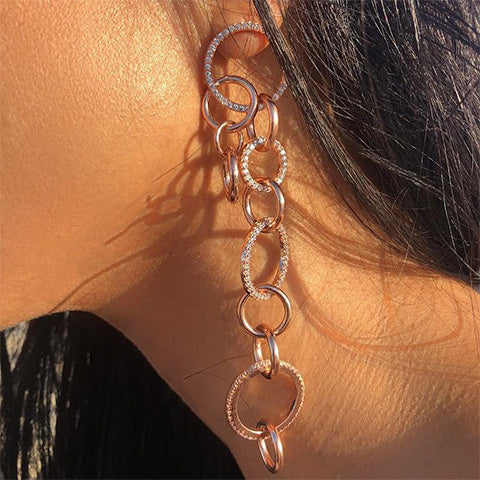 Long round shaped dangling earrings