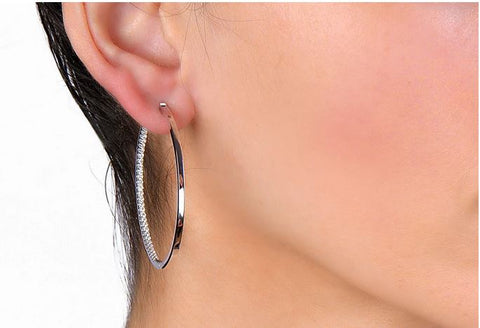 https://nickhorey.com/collections/earrings/products/slim-tire-diamond-hoop