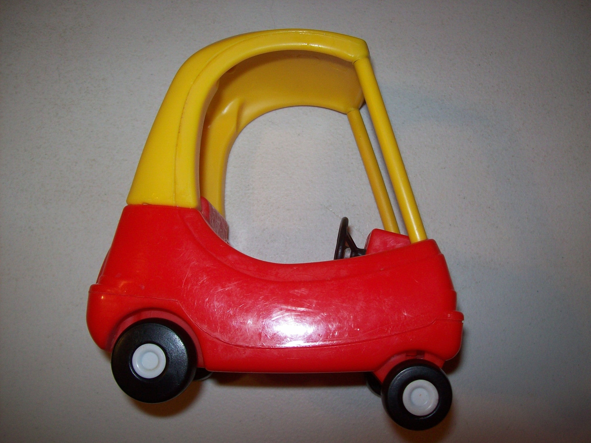 red and yellow toy car little tikes