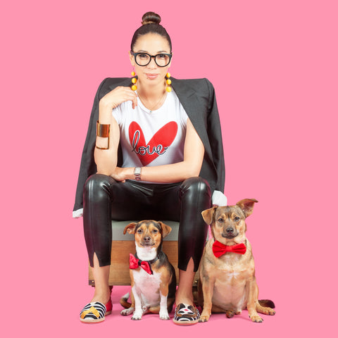 Isa Zapata and her two adopted dogs