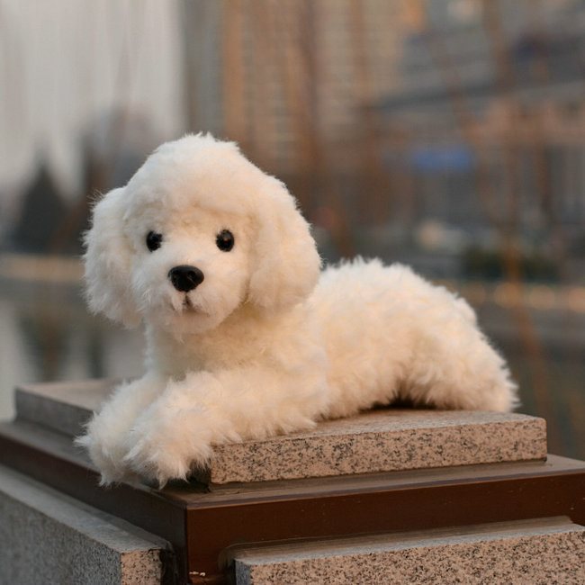 white stuffed animal dog