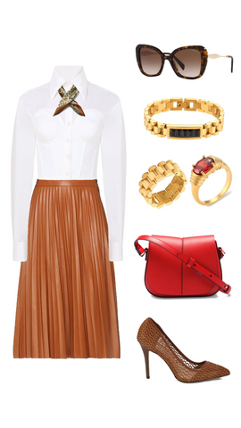 Office outfit with pleated pleather midi shirt and white button down shirt.