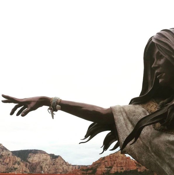 Bronze statue of a native woman.