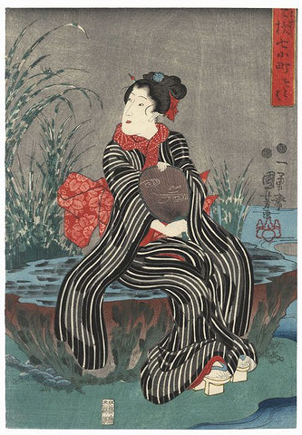 Japanese woodblock print of woman in black and white striped kimonoby Kuniyoshi