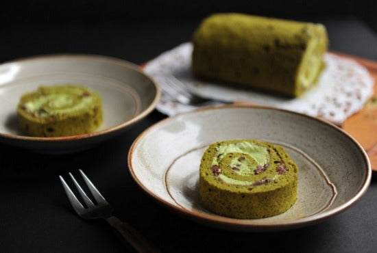 Light and fluffy matcha green tea swiss roll filled with red bean matcha cream filling