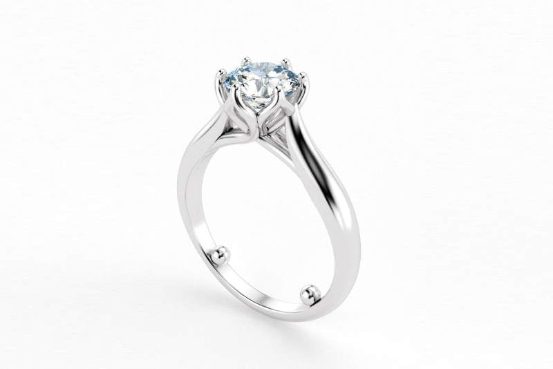 Engagement ring with sizing beads