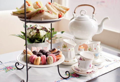 Afternoon tea - Teapot, sandwiches and cake