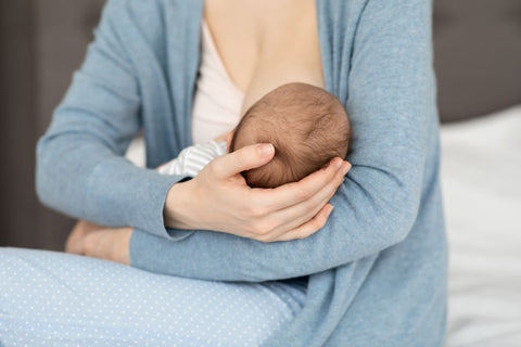 Women breastfeeding a baby - nursing mumma tea