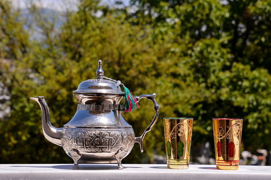 A vintage silver teapot