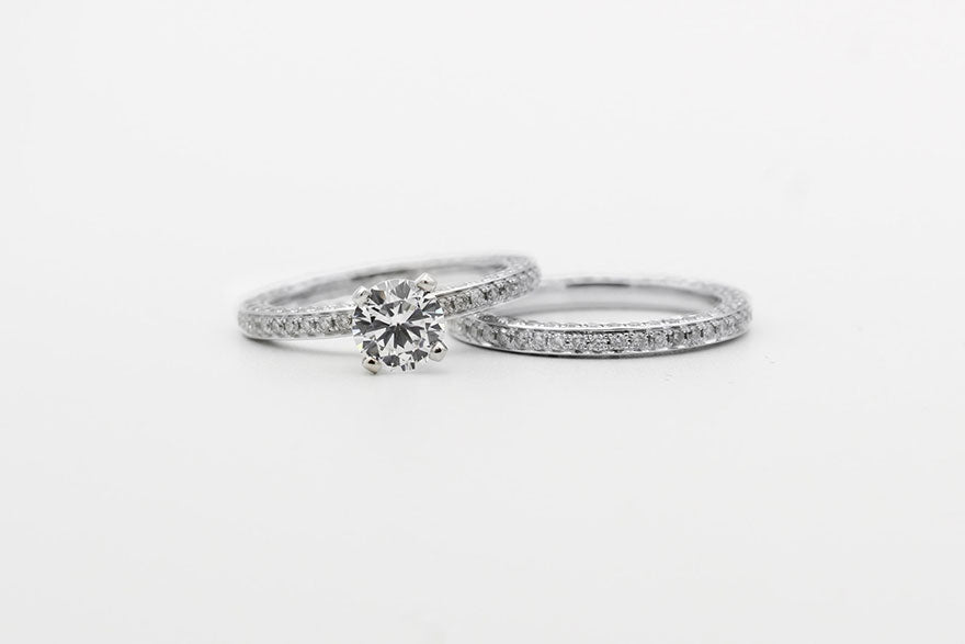 Two diamond and silver rings