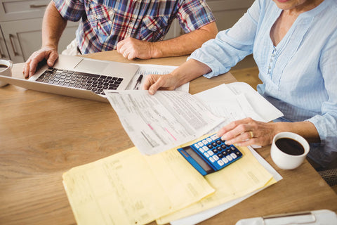 Older couple reviewing bills