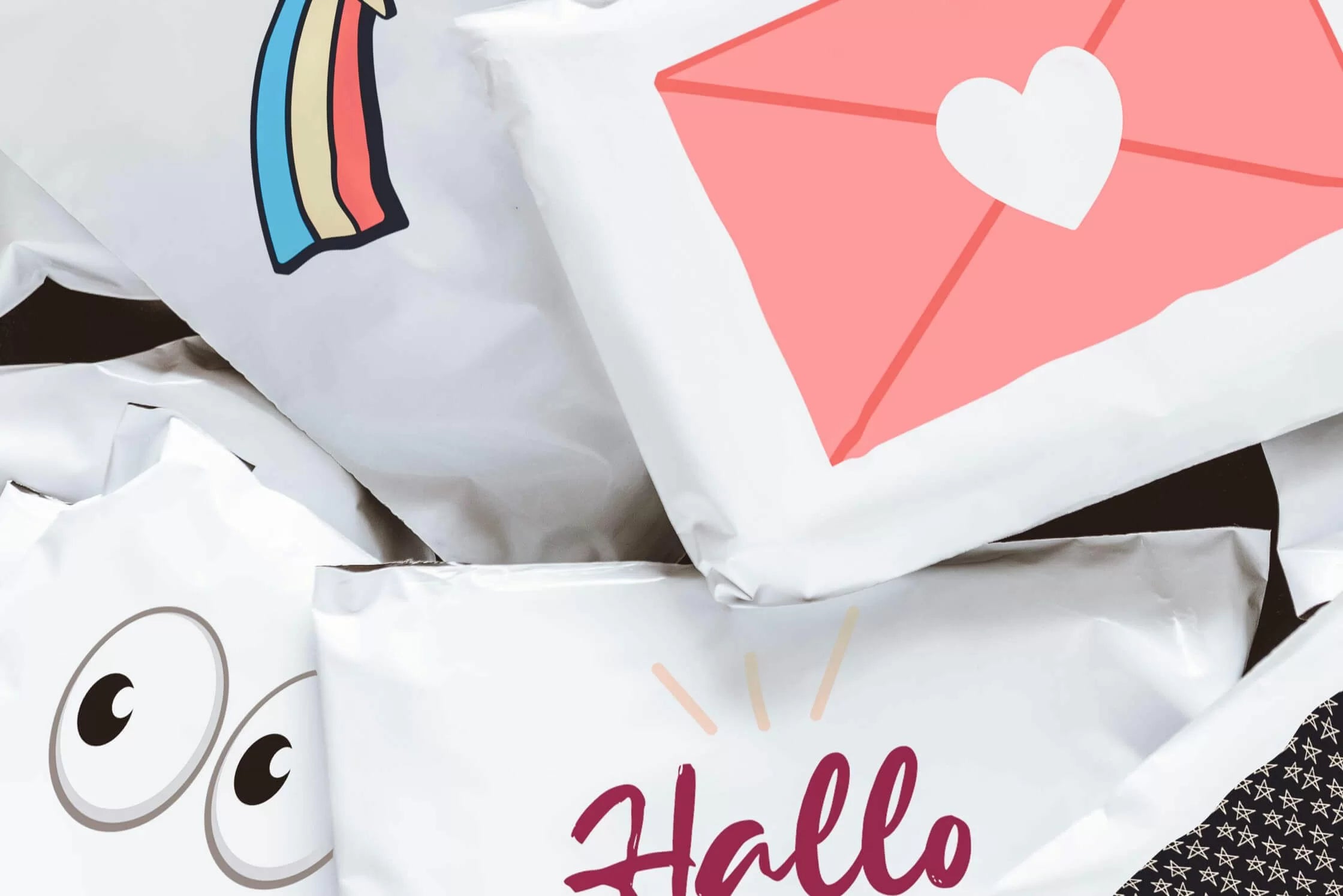 An assortment of Printful's packaging options; many of which feature playful emojis and space for a merchant's logo.