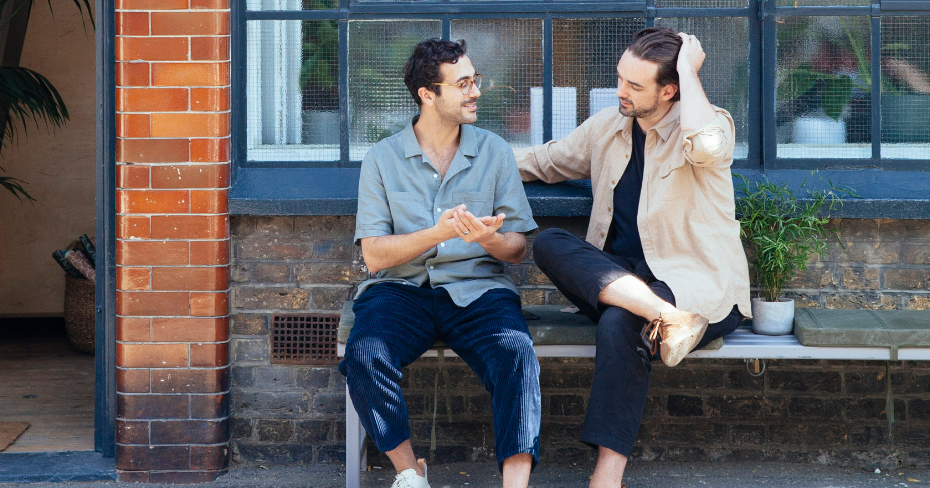 Earl of East founders sitting on bench