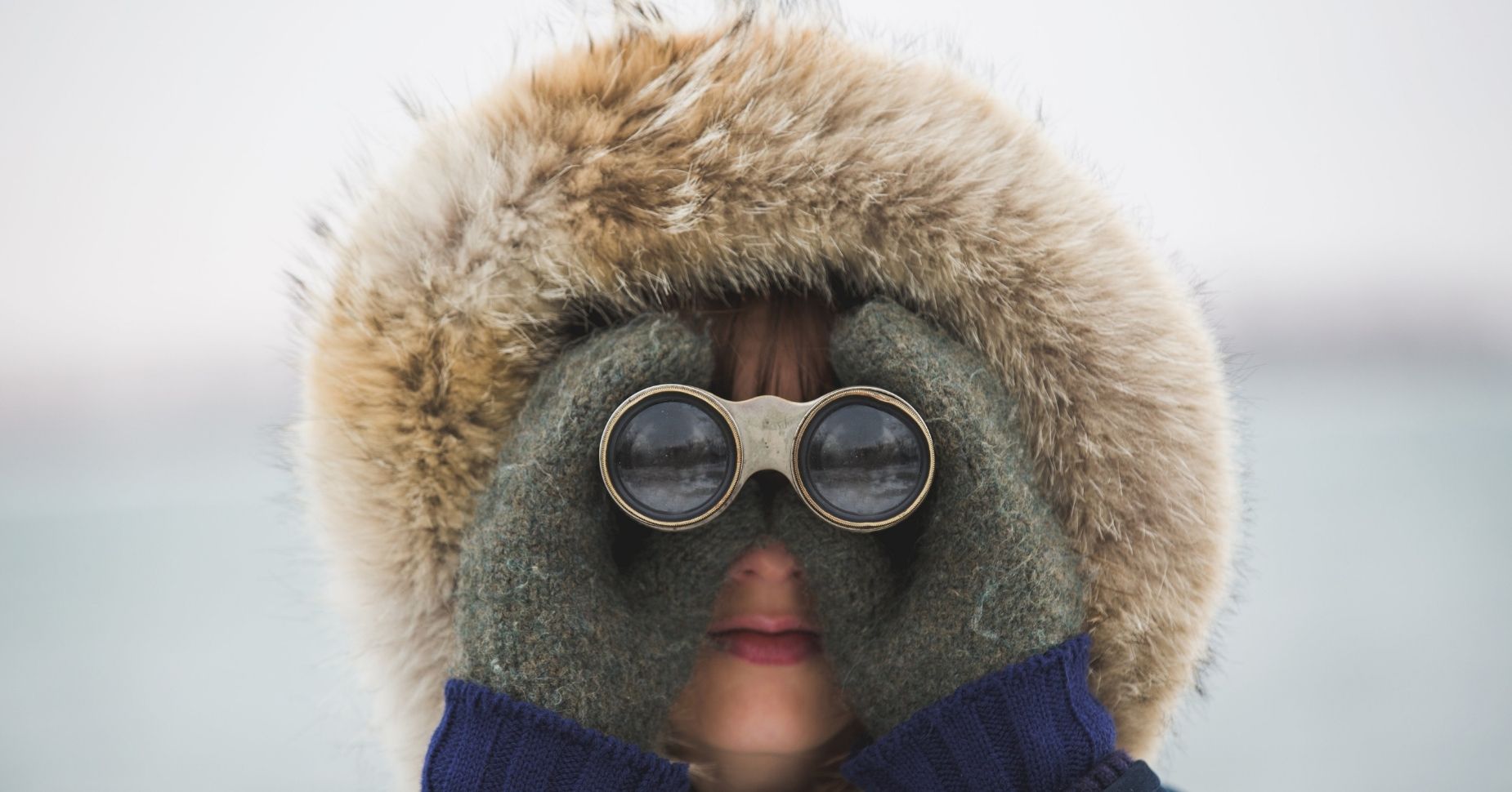 Woman using binoculars