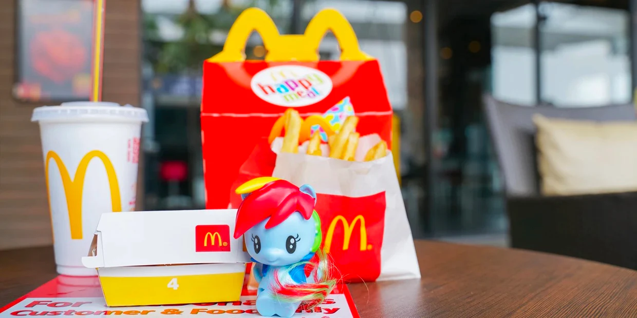 Photograph of McDonald’s Happy Meal sitting on a table