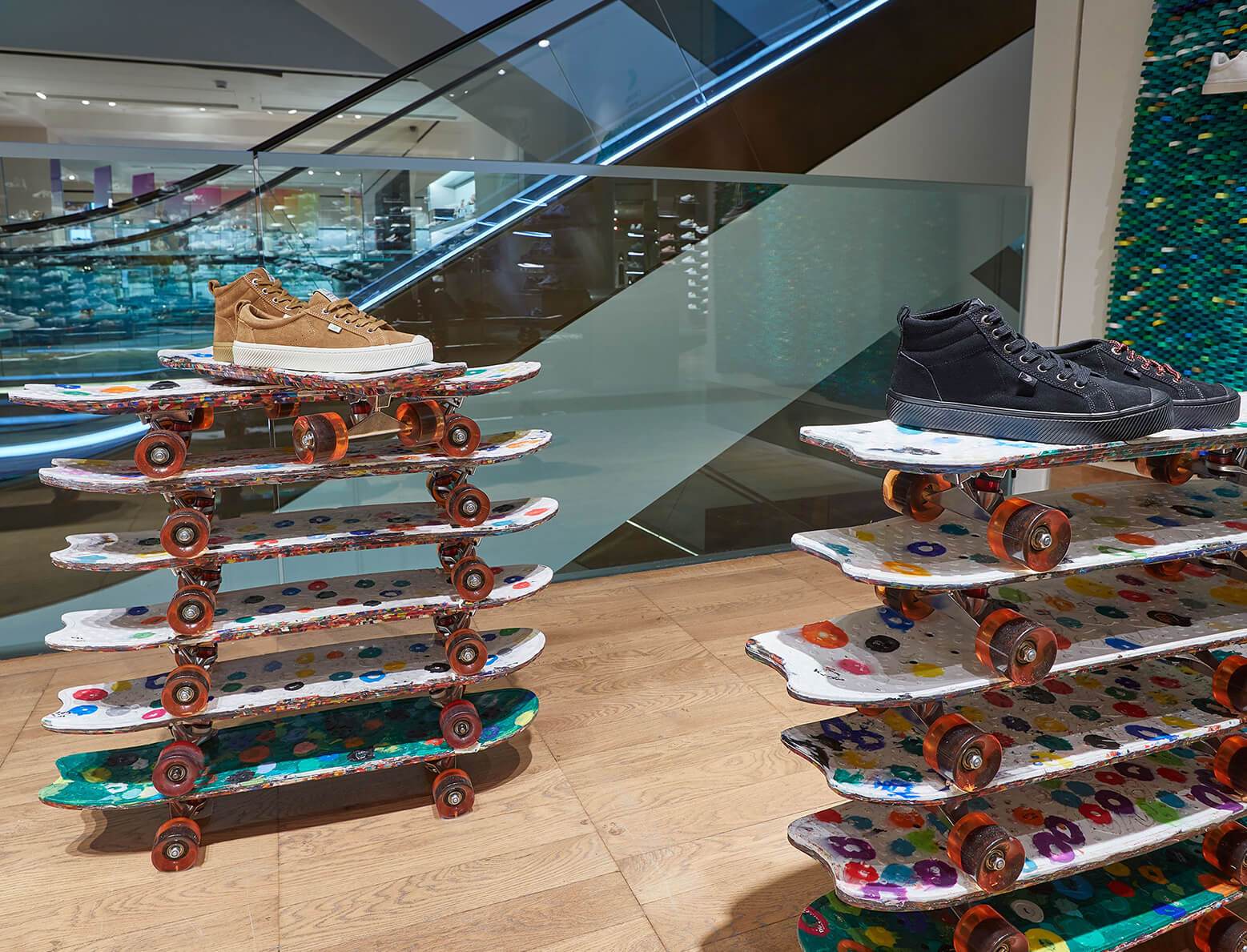 cariuma shoes on skateboards retail display
