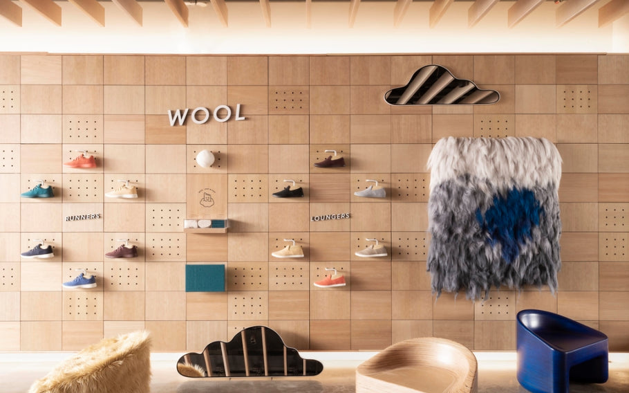 shoe display wall inside an Allbirds store